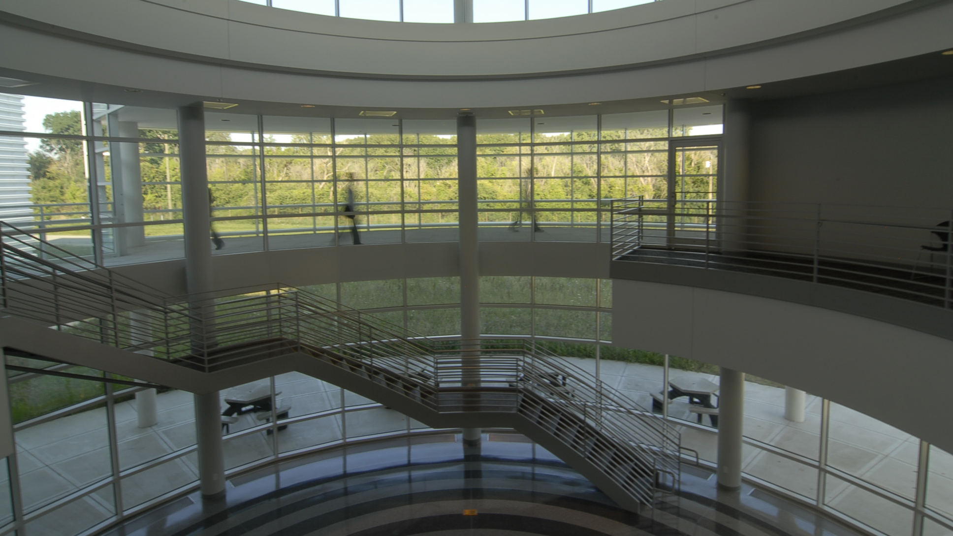 Interior of glass-walled circular atrium.